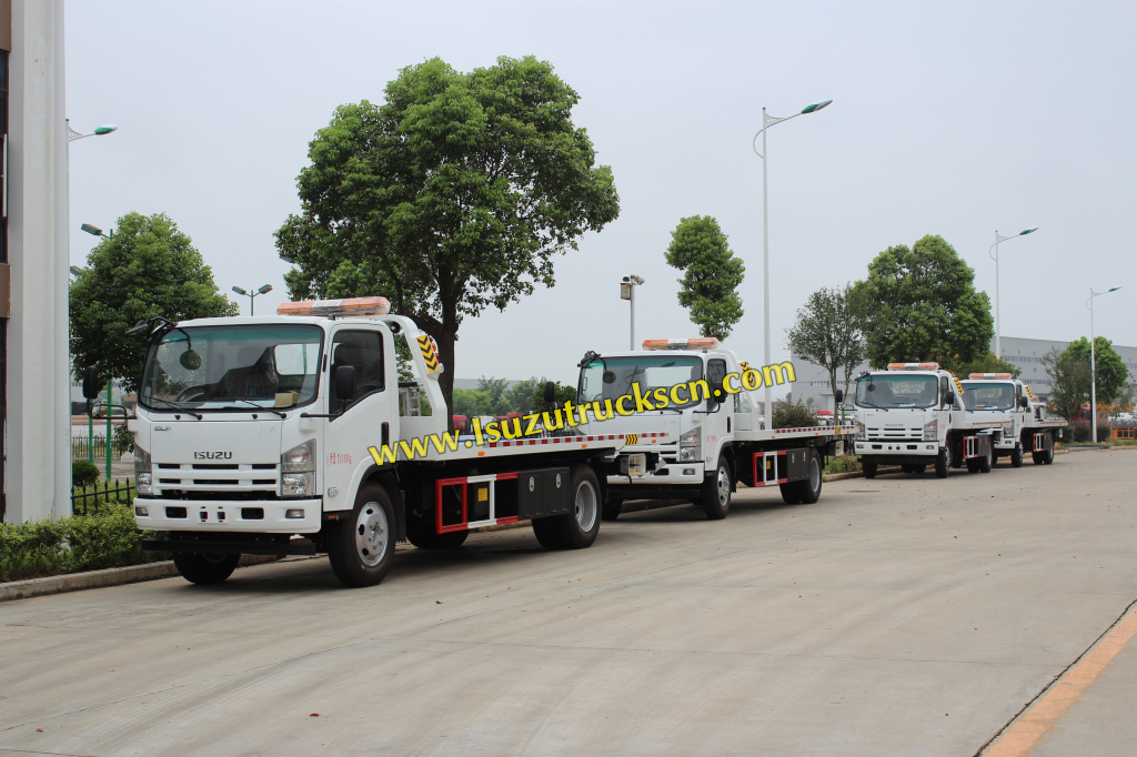 Kunden aus Äquatorialguinea bestellen vier Isuzu 5-Tonnen-Pritschen-Abschleppwagen